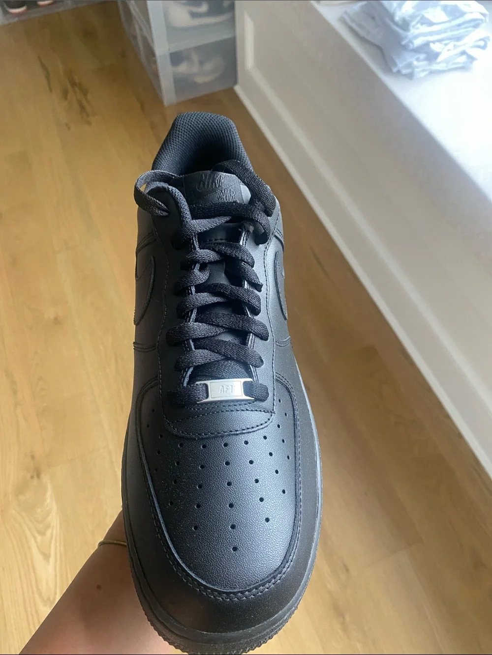 Nike Air Force’s Black Men’s Low-Top Leather Sneakers